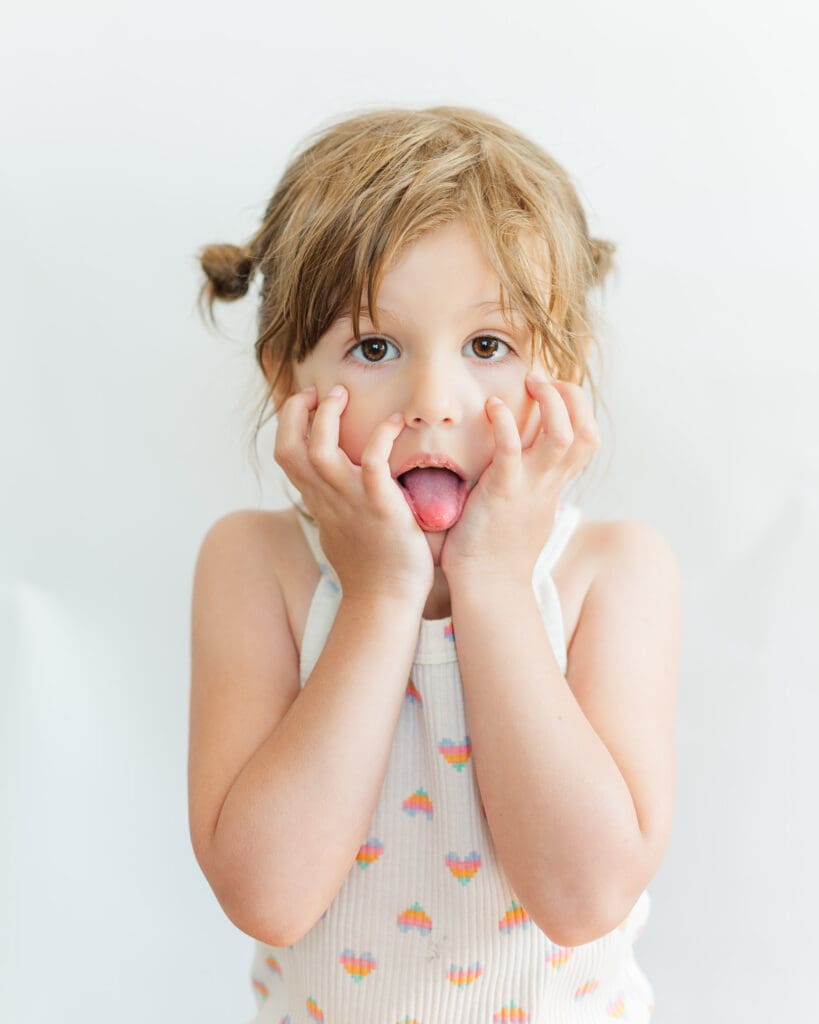 silly portrait of a girl making a shocked face