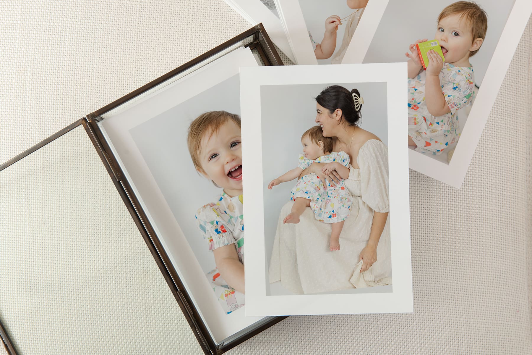 Custom glass photo box with professional family portraits, a perfect heirloom gift for grandparents in Temecula.