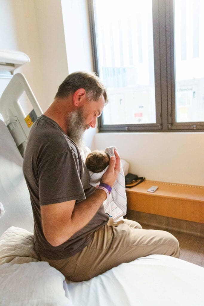 Timeless, film-like newborn photography in Temecula, CA, showcasing the beauty of a new life and the warmth of home.