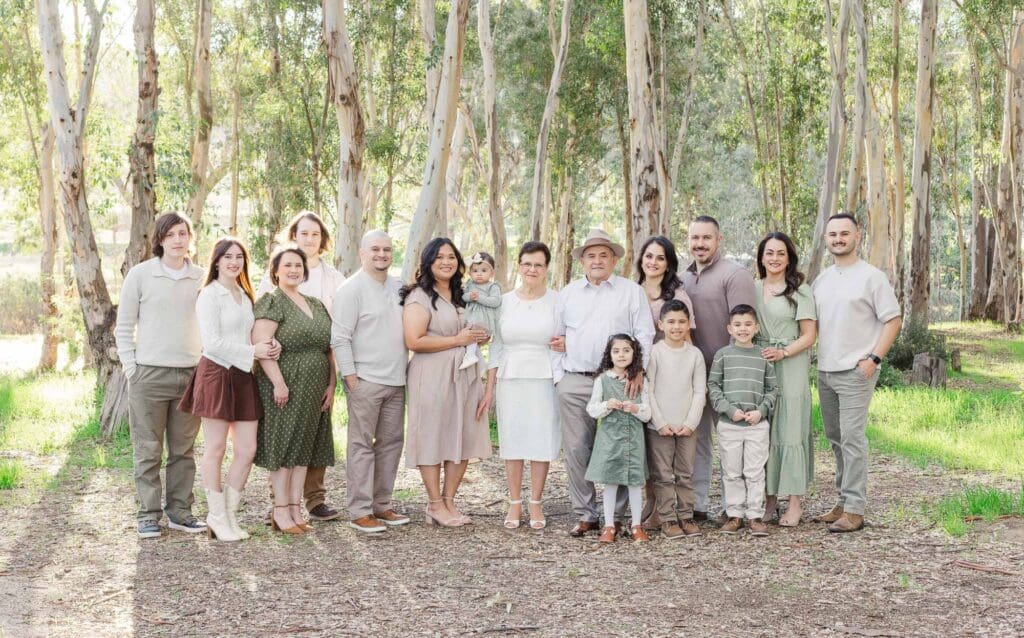 A large family portrait in a Temecula field, showing the beauty of coming together for local Easter events and spring celebrations.